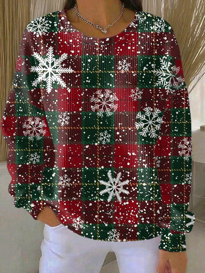 Sofie - Pull de Noël avec des carreaux et des flocons de neige